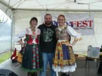 Ivan Tasler with girls in traditional costumes