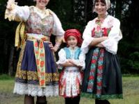 Girls wearing traditional folklore costumes